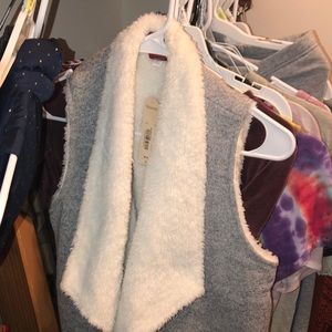 a fuzzy fashionable vest